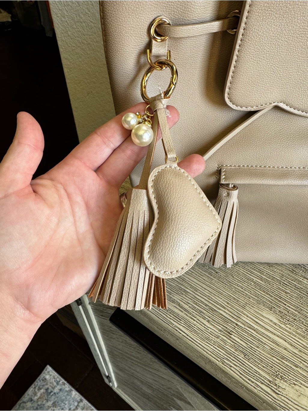 New!!! Hollis Cream Leather Tote Backpack With Tassel Charm — image 2 of 8